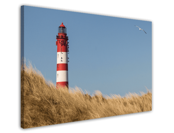 Leuchtturm an Dünen
