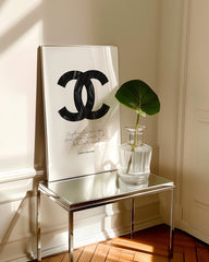 After Hover: Coco Chanel fashion label - quote with black logo