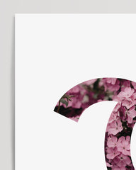 After Hover: Citation de Coco Chanel avec des fleurs roses