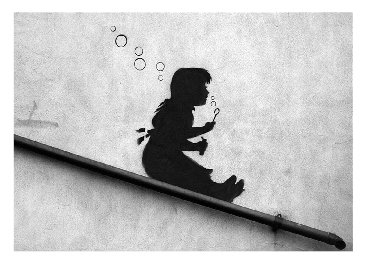 Banksy - Girl with soap bubbles sliding down a slope, wall graffiti, cool and stylish